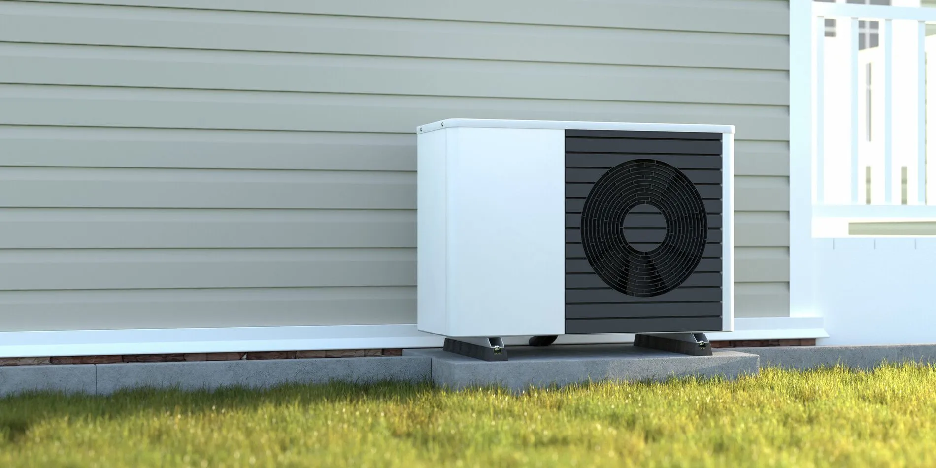 Photorealistic 3d render of a fictitious air source heat pump mounted to a concrete base with vibration dampers on the outside of a house..jpg